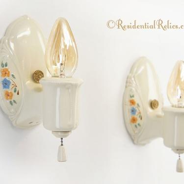 PAIR Porcelier bath sconces with floral decoration, circa 1930s