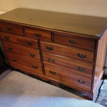 Nine Drawer Cherry Dresser with Glass Top