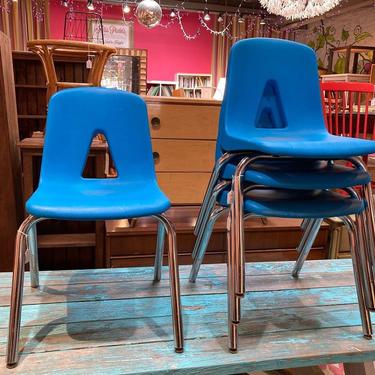 Classic blue stacking school chairs. 4 available 16.5” x 16.5” x 31” seat height 18”