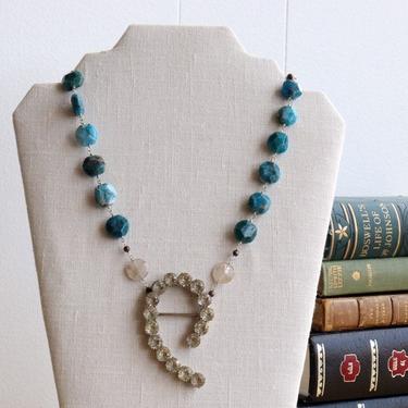 The Work of Spring [apatite, rutilated quartz, vintage buckle, sterling silver] 