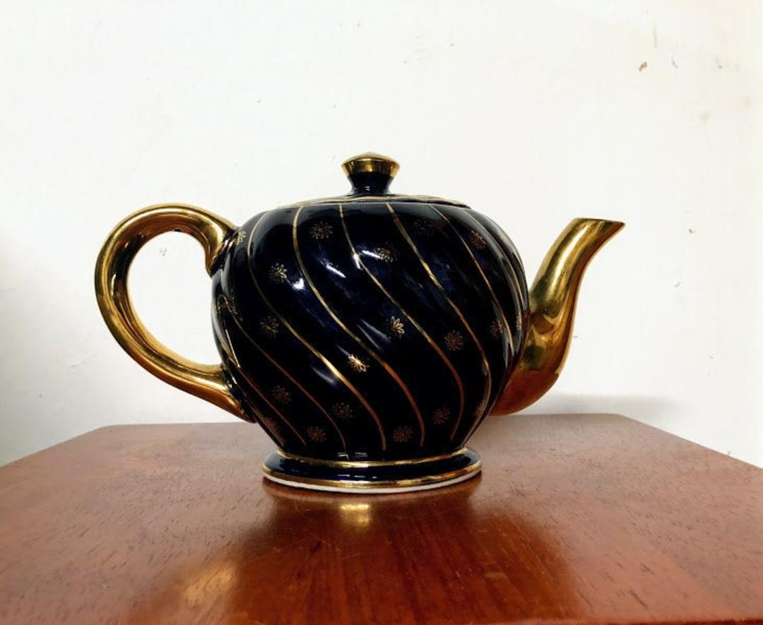 Vintage Cobalt Blue and Gold Teapot Made in Japan Over the Years
