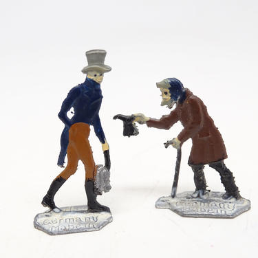 2 Antique Heinrichsen Winter German Flat Lead Men,  with Skates and Cane, Vintage Hand Painted Lead Toy for Christmas Putz 