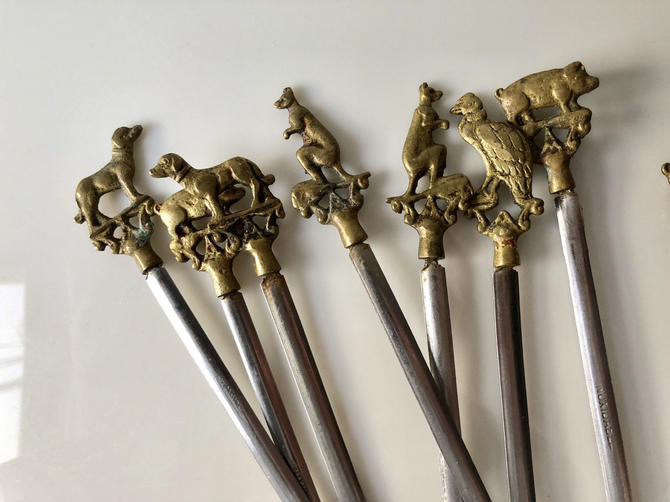 Skewers 6 vintage metal skewers with good brass animals