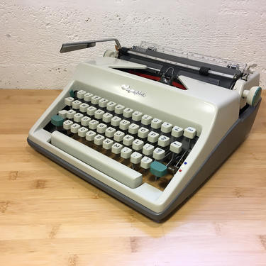 1966 Olympia SM8 Portable Typewriter with Case, New Red/Black Ribbon, Cleaning Kit, Owner's Manual 