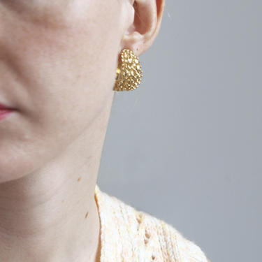 Textured gold tone hoop clip on earrings 