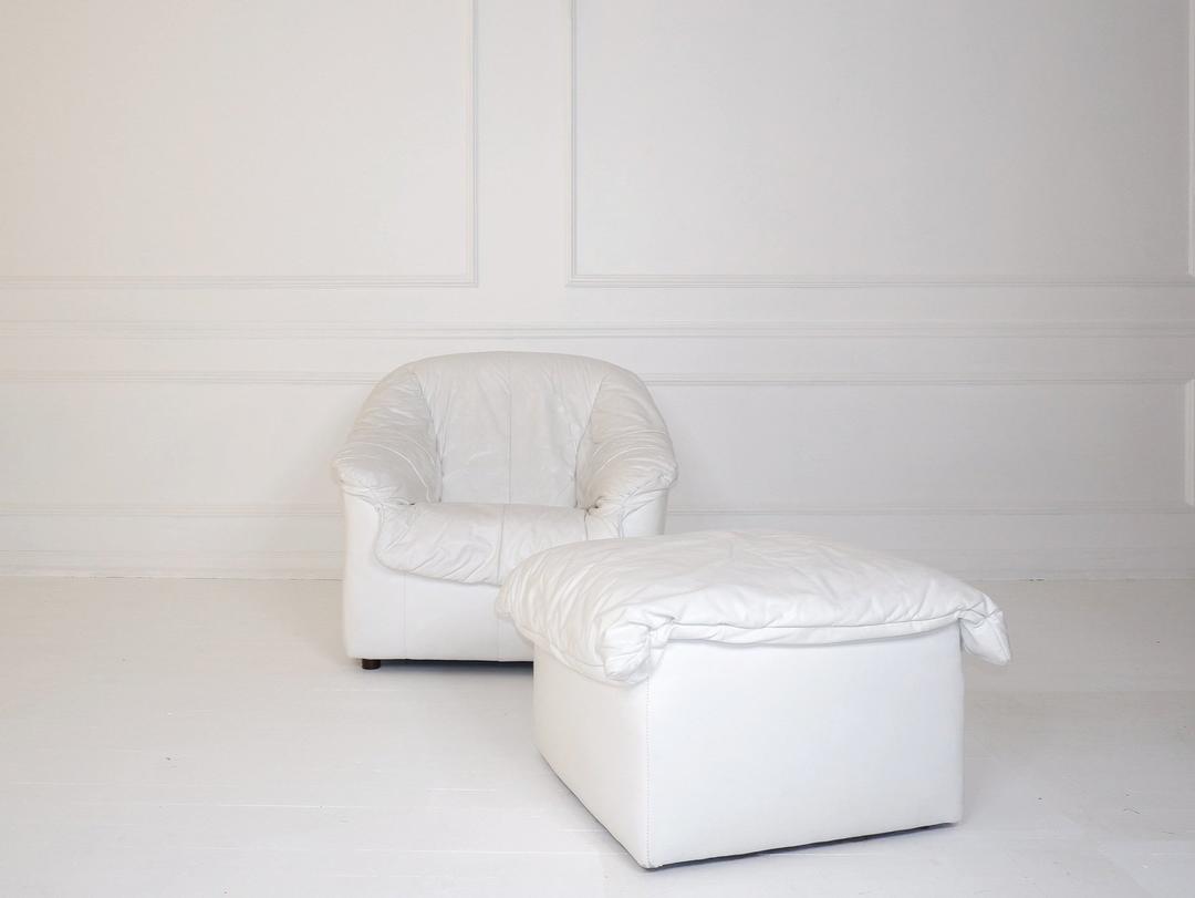 VINTAGE WHITE LEATHER CHAIR & OTTOMAN The Break Brooklyn, NY
