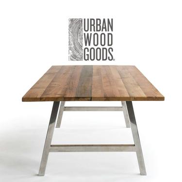 Solid Wood Dining Table made with reclaimed wood planks and brushed stainless steel legs in choice of size, height, finish. 