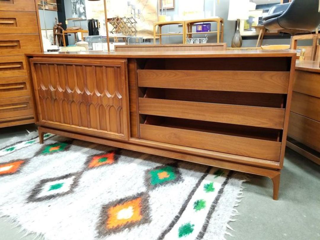 MidCentury Modern walnut dresser with sliding door front Peg Leg
