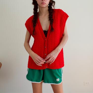 handknit red cableknit oversized sweater vest with flower buttons 