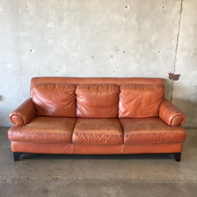 Saddle brown leather sofa