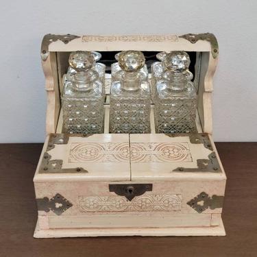 Antique English Painted Wood Tantalus Games Set with 3 Cane Pattern Cut Crystal Colorless Glass Decanters, Late 19th / Early 20th Century 