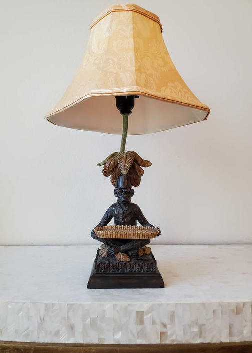 Vintage bellhop store monkey lamp