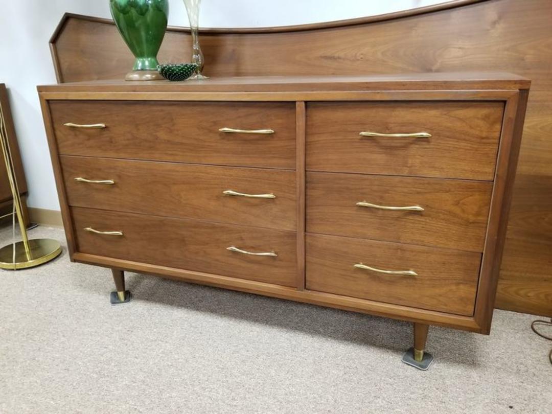 MidCentury Modern walnut six drawer dresser with brass pulls Peg Leg