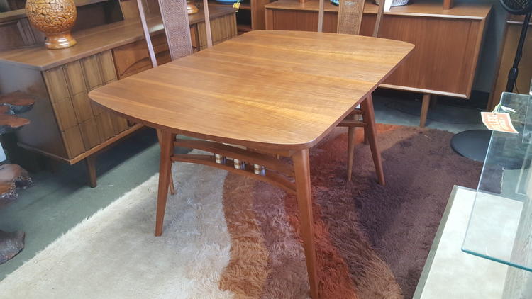 Mid-Century Modern walnut dining table with chrome details