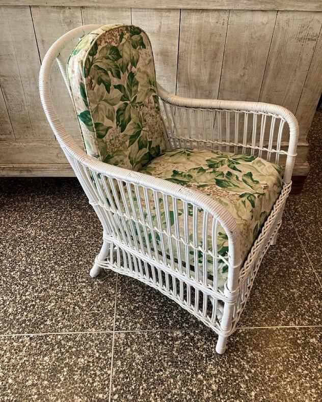 White wicker loungey chair. 25” x 26” x 32” seat height 17”