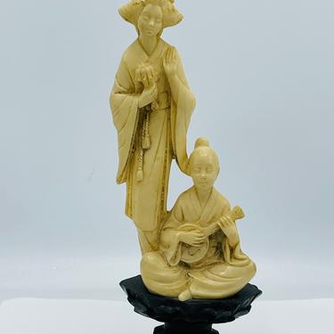 NORLEANS 10&quot; Carved Resin Figurine Asian Woman Boy Playing Sitar Ivory-Look  Wood Stand- Nice Condition 
