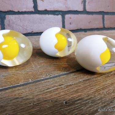 3 Acrylic Egg Paperweights 