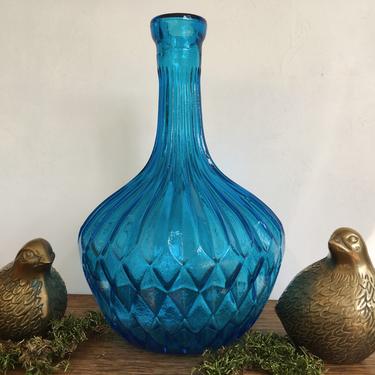 Retro hotsell MCM Blue Glass Bottle Embossed Bird and Flower Vintage Beautiful