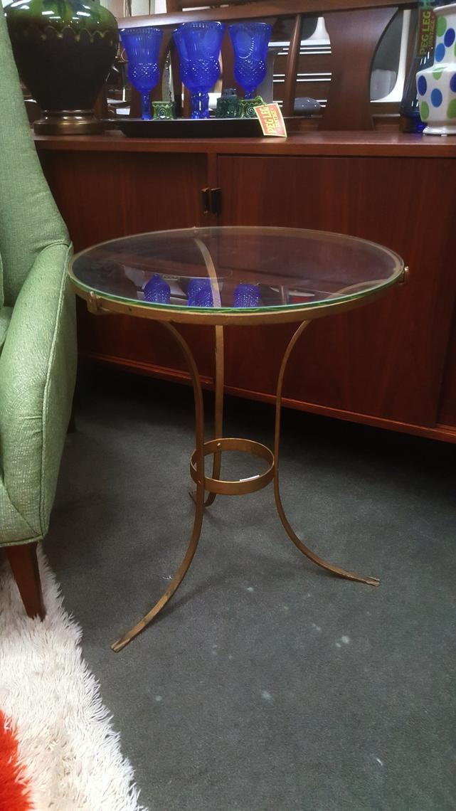 Vintage coppertoned round side table with glass top Peg Leg Vintage