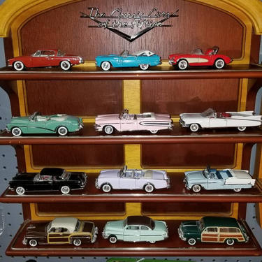 Franklin Mint The Classic Cars of the 50s complete set with Display case. 