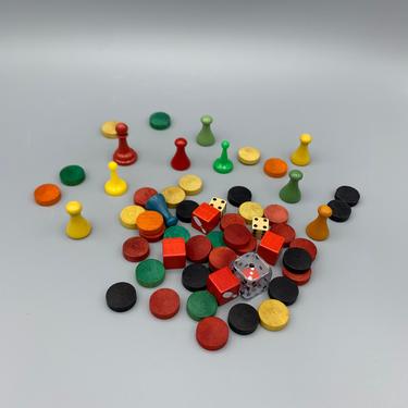 Vintage assortment of board game pieces 