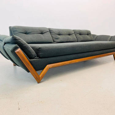 mid century modern gondola sofa with walnut face trim by designer Adrian Pearsall for Craft Associates 