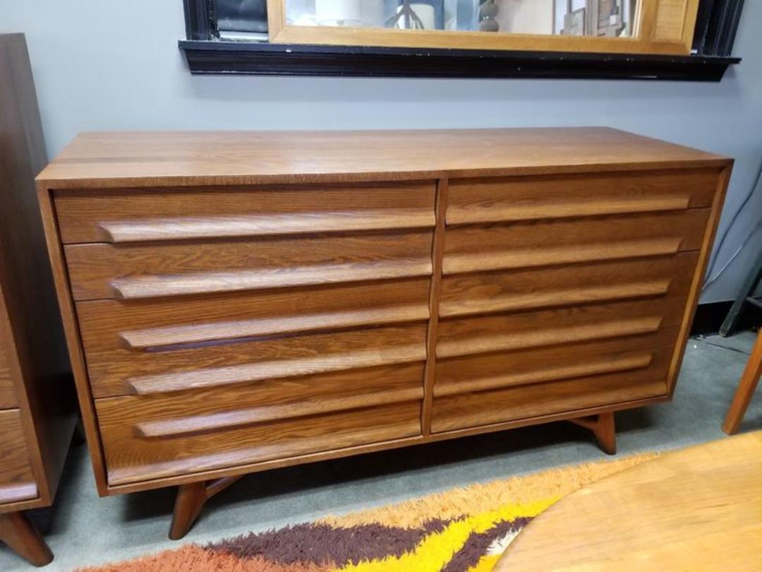 MidCentury Modern oak dresser with long sculpted pulls Peg Leg