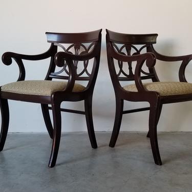 A Pair of Regency Style Carved Mahogany Elbow Chairs 