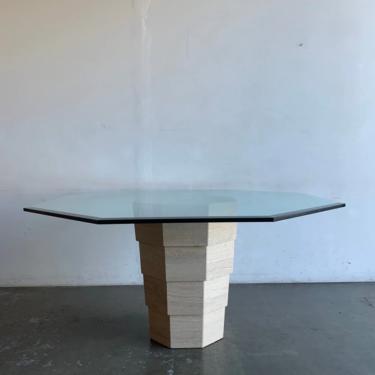Stacked travertine and glass dining table 