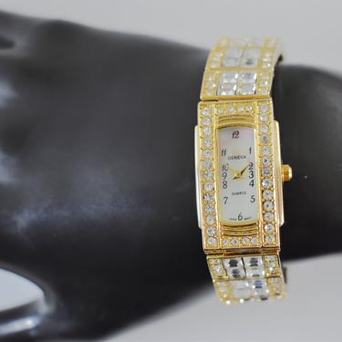 80's Geneva Elite crystal gold tone watch bracelet, fabulous woman's rectangular MOP face bling statement wrist watch 