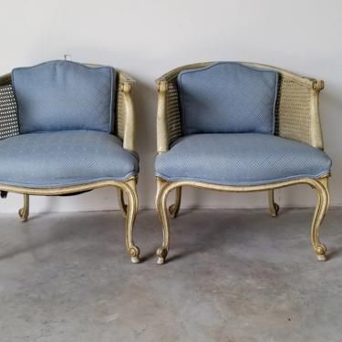 French Hollywood Regency Carved Wood and Cane Barrel Back Lounge Chairs - a Pair 