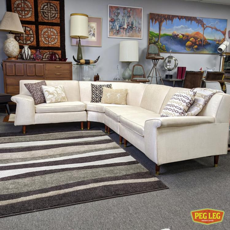 MidCentury Modern sectional sofa with builtin corner table Peg Leg