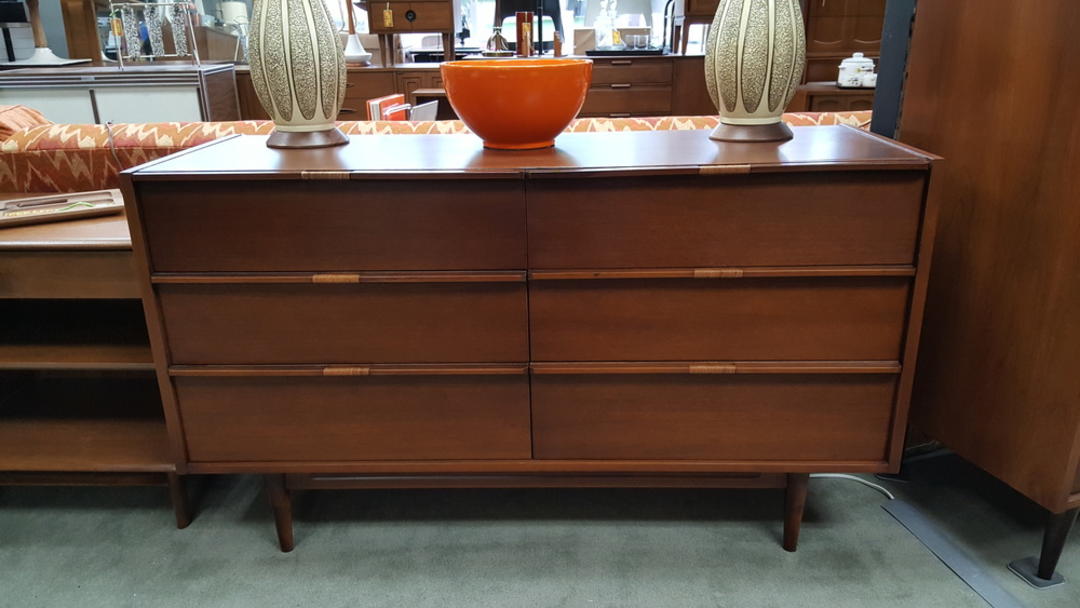 MidCentury Modern American walnut 6drawer dresser with rattanwrapped