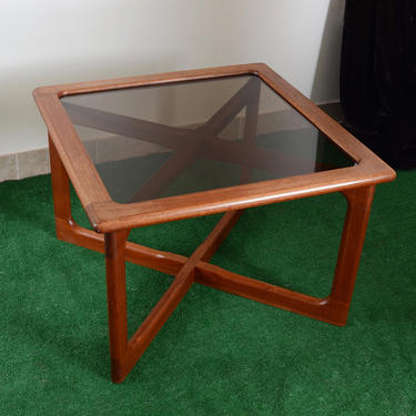 Midcentury Danish Dyrlund sculptural teak wood table with smoked glass top 