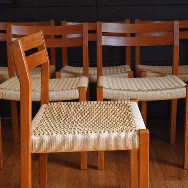 Six Danish modern teak Moller 401 dining chairs w/paperchord seats 