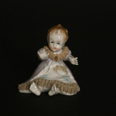 vintage porcelain baby figurine 