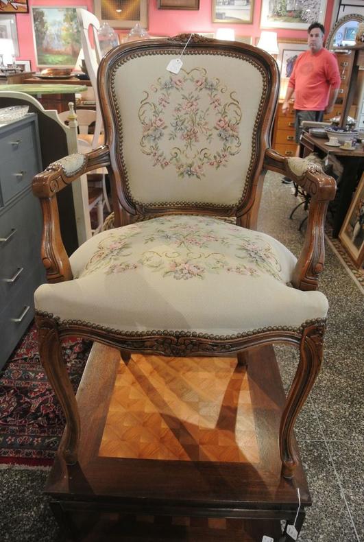 Upholstered needlepoint chair. $125