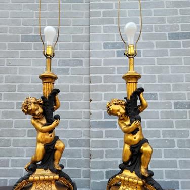 Large Gilt Table Lamps in the form of a Cherub or Putti- Pair