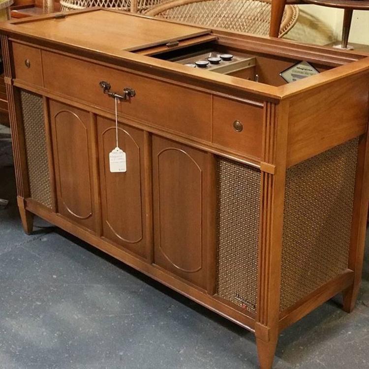 Mid-century stereo console in working order. Radio, turntable, auxiliary input. Magnavox. $395. 45" wide x 17.5" deep  x 29" tall.