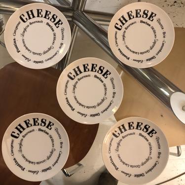 Set of 5 porcelain cheese plates.