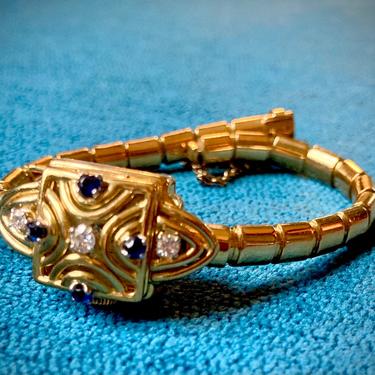 Gubelin Gold Bracelet Watch with Diamonds and Sapphires 