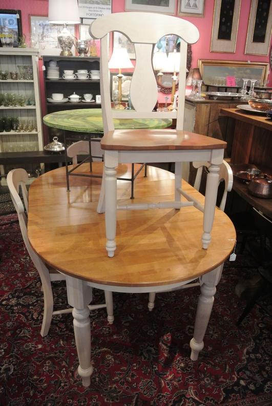 Oval table with one leaf and four chairs. $350