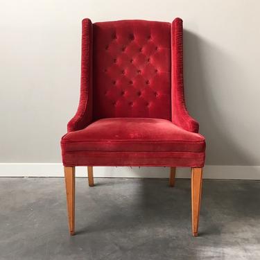 vintage tufted red velvet slipper chair.