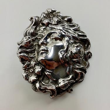 Art Nouveau Brooch - Profile of a Statuesque Woman - Surrounded by Flowing Hair and Flowers - Sterling Silver - Locking Clasp 