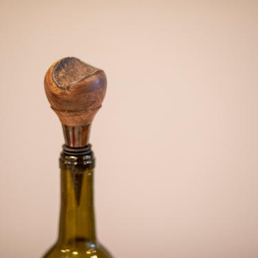 Modern Style Walnut with Bark Inclusion on Black Metallic Wine Bottle Stopper 