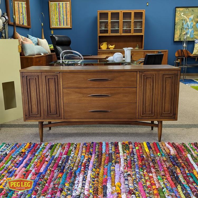 Walnut credenza from the Sculptra collection by Broyhill
