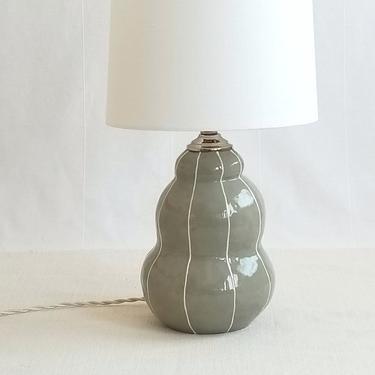 Modern ceramic lamp. Pottery table lamp 
