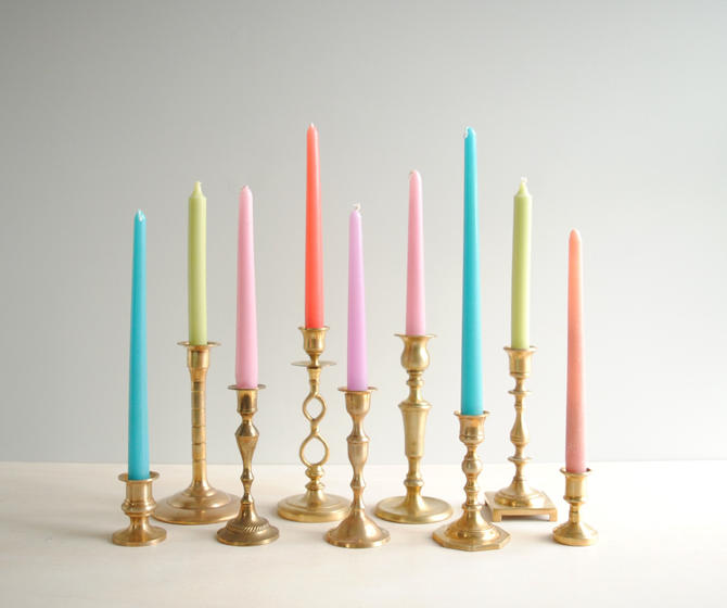 Set of Four Brass Candlestick Holders in Graduated Sizes