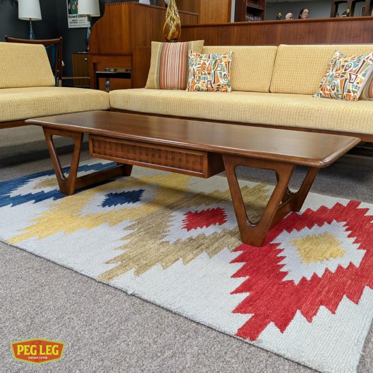 Mid-Century Modern walnut coffee table from the Perception collection by Warren Church for Lane