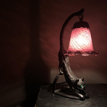 Spooky Art Deco repro table lamp, cast iron black cat, light up green eyes, purple glass shade, gothic Halloween decor 